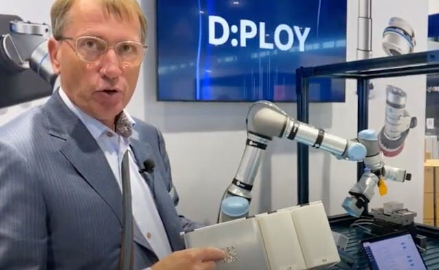 Enrico Krog Iversen, CEO of OnRobot, explains the D:Ploy system during a preview of the technology at IMTS 2022.