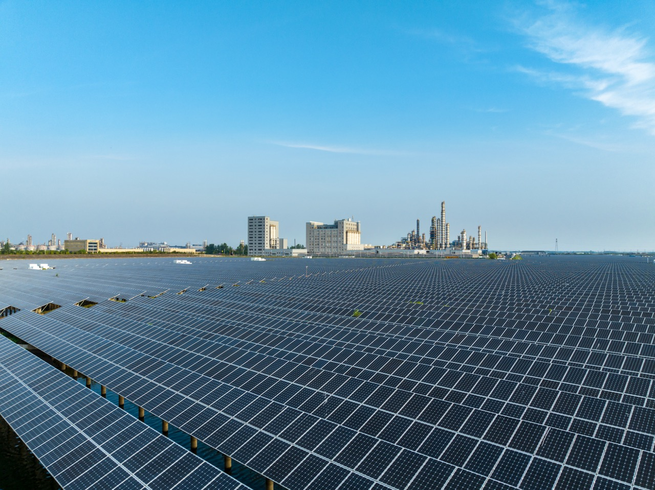 Chemical plant partially powered by adjacent solar field.