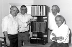 The Modicon 084 (original PLC) development team (from left to right): Dick Morley, Tom Boissevain, George Schwenk, and Jonas Landau. The Modicon 084 (original PLC) development team (from left to right): Dick Morley, Tom Boissevain, George Schwenk, and Jonas Landau.