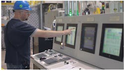 Monitoring production of GAF's EnergyGuard Polyiso Insulation—a roof insulation panel made of glass fiber reinforced cellulosic felt facers bonded to a core of polyisocyanurate foam. Monitoring production of GAF's EnergyGuard Polyiso Insulation—a roof insulation panel made of glass fiber reinforced cellulosic felt facers bonded to a core of polyisocyanurate foam.