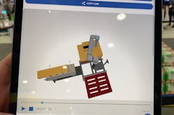 Reviewing the digital twin in Columbia/Okura&apos;s miniPal palletizing system on a mobile device.