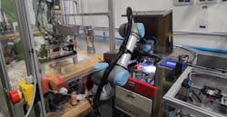 In this automotive supplier’s application, a combination cartesian robot and Universal Robot cobot (delivered via Rapid Robotics' robots as a service program) are used in a laser engraving application for an automotive center console component. In this automotive supplier’s application, a combination cartesian robot and Universal Robot cobot (delivered via Rapid Robotics' robots as a service program) are used in a laser engraving application for an automotive center console component.