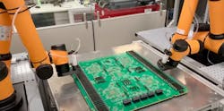 Rapid Robotics&apos; robots featuring custom grippers for printed circuit board assembly.