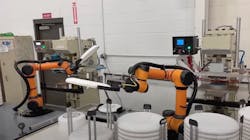 Rapid Robotics' robots with custom grippers for frisbee manufacturing. Rapid Robotics' robots with custom grippers for frisbee manufacturing.