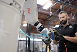 A user programs an ABB robot using the ForgeOS interface.