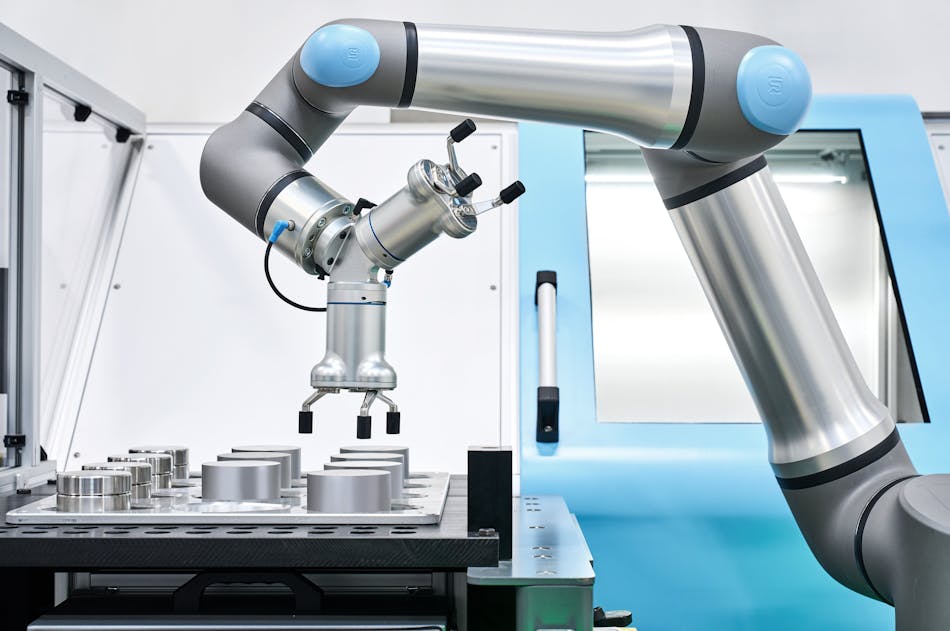 The UR30 in a machine tending application. Source: Universal Robots.