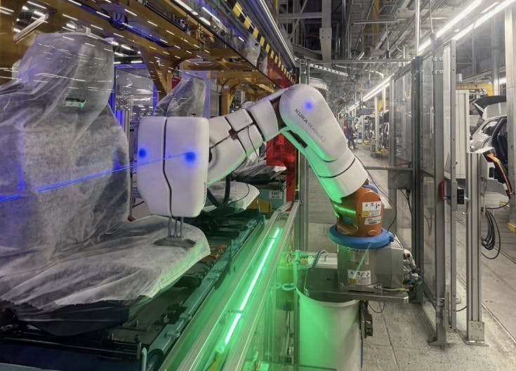 A KUKA Agilus robot outfitted with Airskin&rsquo;s collaborative robot technology in the seat measurement work cell at BMW Regensburg.