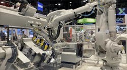 The new ABB IRB 7710 robot exhibiting its assembly capabilities at Automate 2024.