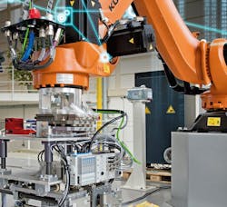 KUKA industrial robot with specialized end of arm tooling. Source: Siemens KUKA industrial robot with specialized end of arm tooling. Source: Siemens