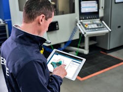 Zel X on a mobile table on the factory floor. Zel X on a mobile table on the factory floor.