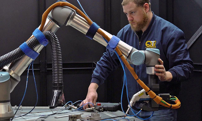 QTR improved welding efficiency with a Universal Robots cobot and an IPG handheld laser welder. Source: Universal Robots