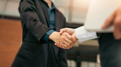 Businessman handshake for teamwork of business merger and acquisition Businessman handshake for teamwork of business merger and acquisition