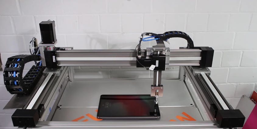 This RBTX robotic system inspects touchscreens.