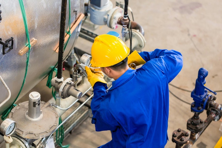 maintenance worker at industrial facility