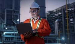 engineer reviews operational data at a processing facility engineer reviews operational data at a processing facility