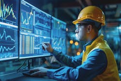 Industrial engineer reviews operational data Industrial engineer reviews operational data