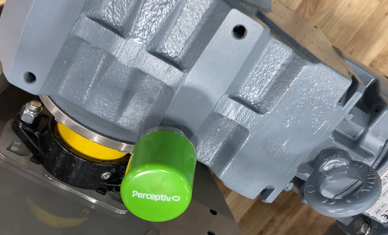The Regal Rexnord Perceptive sensor on a motor.