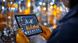 reviewing operations data on the factory floor reviewing operations data on the factory floor