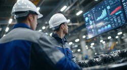 manufacturing workers view displays showing production data analytics manufacturing workers view displays showing production data analytics