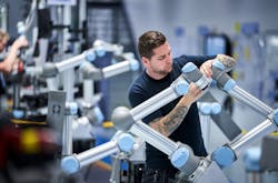Teradyne Robotics' worker assembling a Universal Robot's cobot. Teradyne Robotics' worker assembling a Universal Robot's cobot.