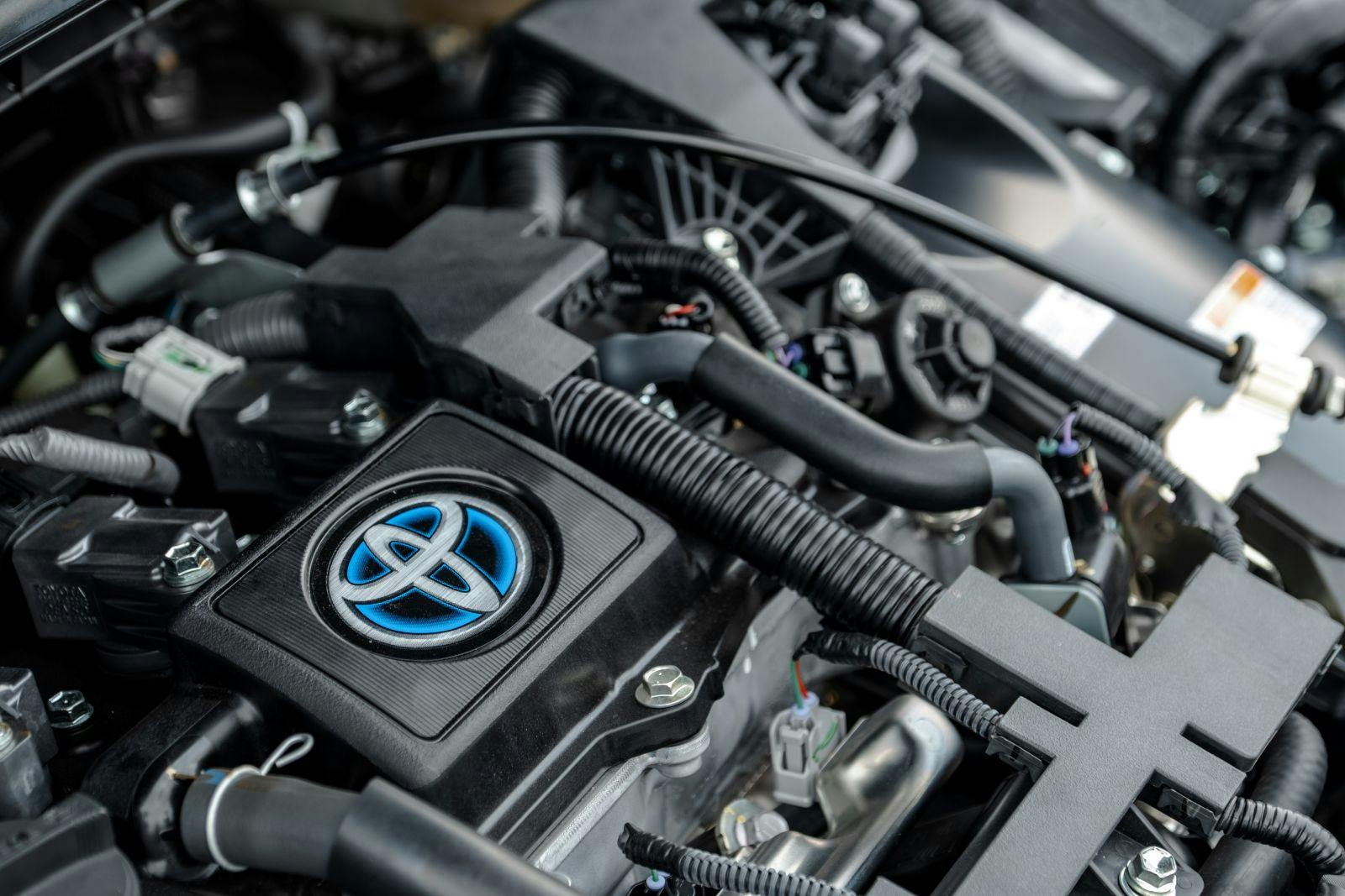 The engine room of 2020 Toyota Corolla Cross showing the hybrid engine.