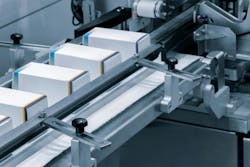 Automatic packaging conveyor line in pharmaceutical factory, pharmaceutical industrial concept background Automatic packaging conveyor line in pharmaceutical factory, pharmaceutical industrial concept background