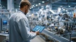 worker reviews production operations data via a consolidated platform worker reviews production operations data via a consolidated platform